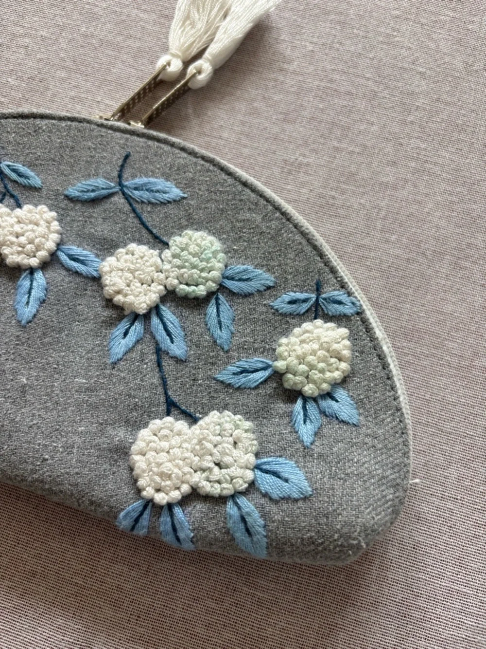 Grey embroidered floral half moon whimsical coquette clutch bag.